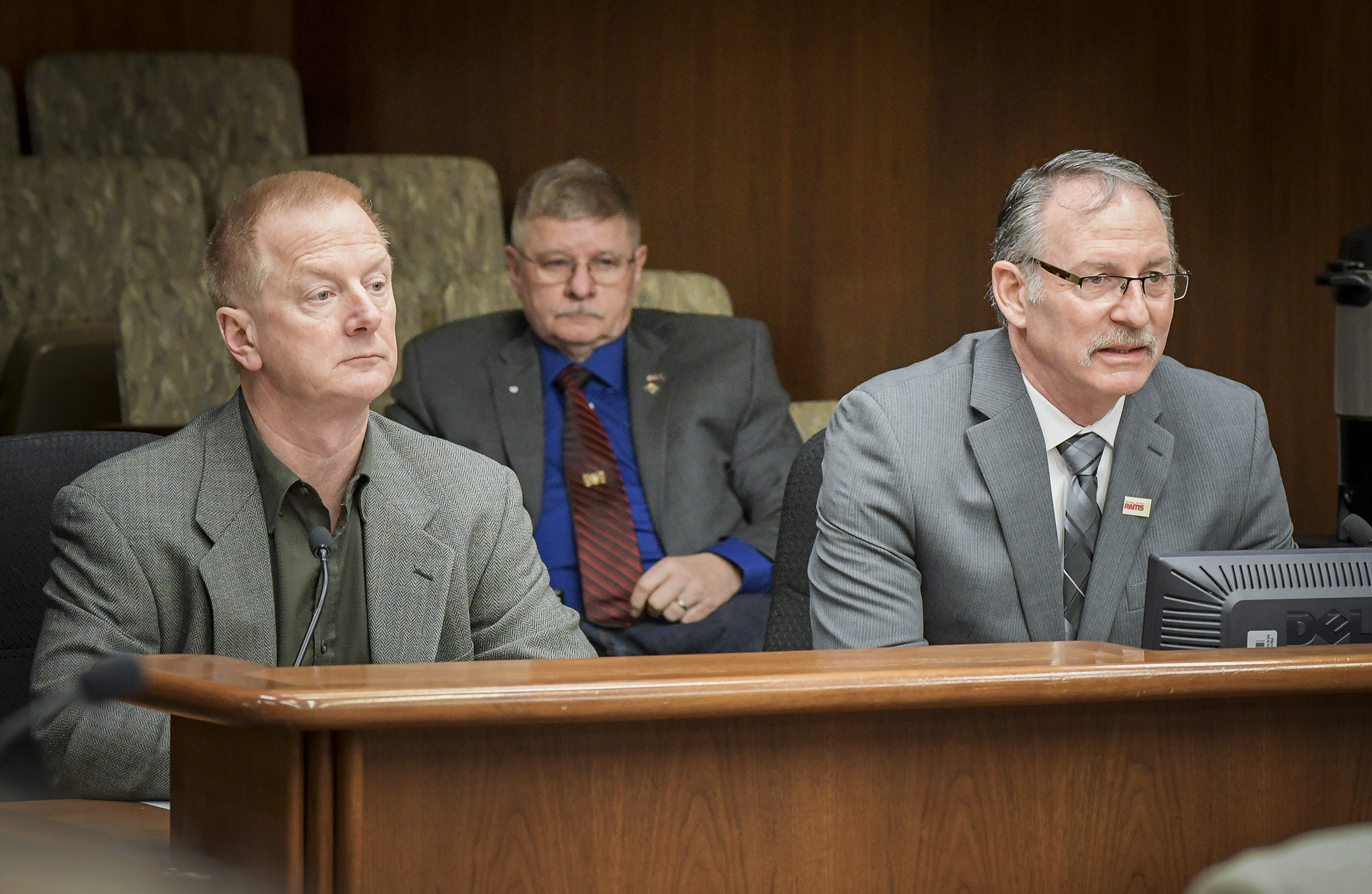 NTS Environmental Science and Engineering President Rick Crum, left, and Steve Giorgi, executive director of the Range Association of Municipalities and Schools, testify before the House's environment and natural resources committee. Photo by Andrew VonBank